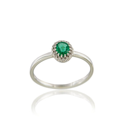 Anello smeraldo naturale ovale ct 0,30 con contorno di brillanti