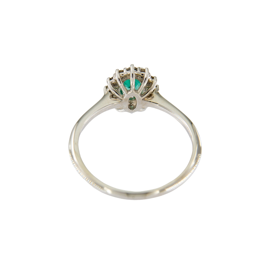 Anello smeraldo naturale ovale ct 0,40 con contorno di diamanti