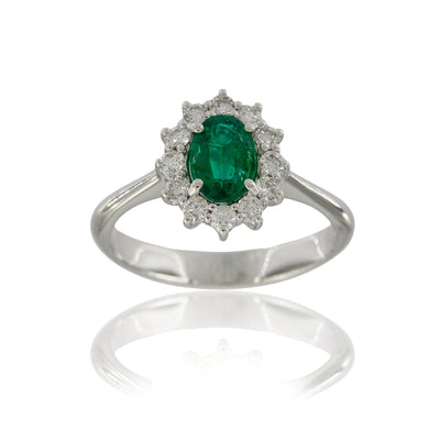 Anello smeraldo naturale ovale ct 0,66 con contorno di diamanti ct 0,40