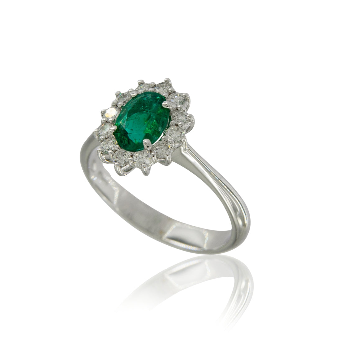 Anello smeraldo naturale ovale ct 0,66 con contorno di diamanti ct 0,40